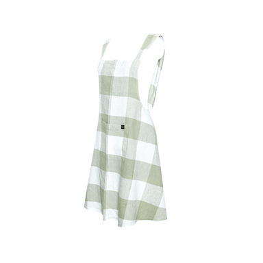 White background with a green plaid cotton linen apron. 