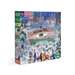 an image of a 1000 piece puzzle box set against an all white background. The puzzle is an image of skaters ice skating in a park with the new York skyline in the background. The image is framed by evergreen trees covered in snow! 